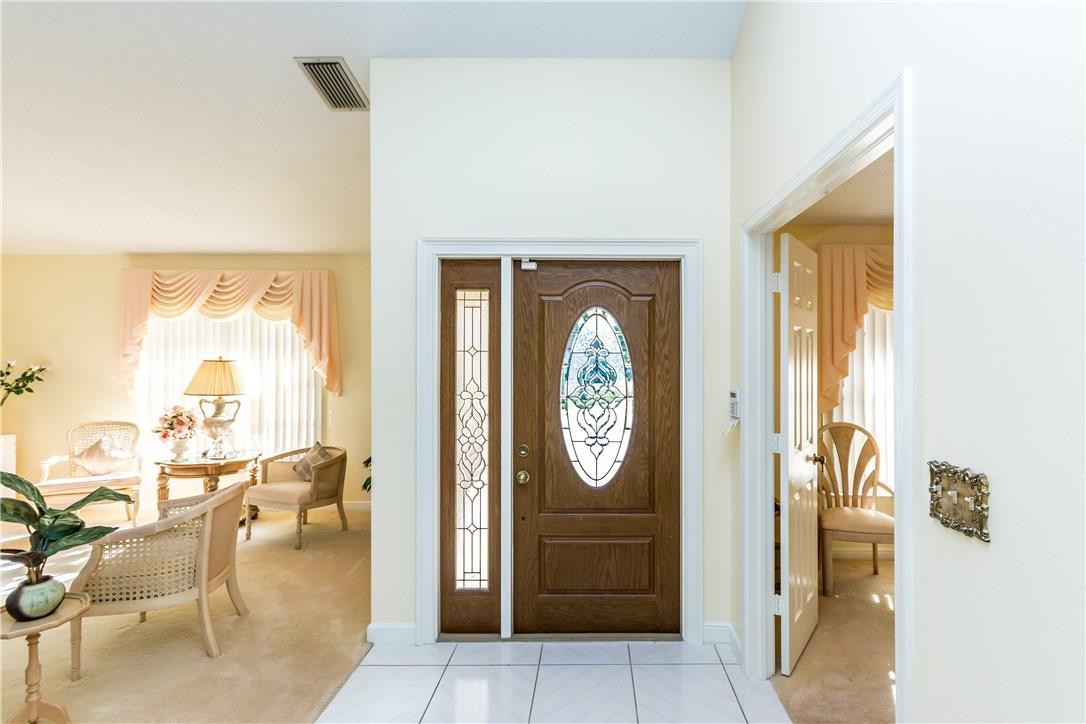 22870 Greenview Terrace Boca Raton, FL 33433 - Photo 42 of 57 a view of living room with furniture and a window