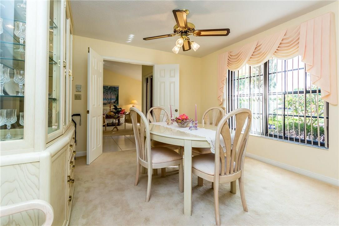 22870 Greenview Terrace Boca Raton, FL 33433 - Photo 43 of 57 a view of a dining room with furniture window and outside view