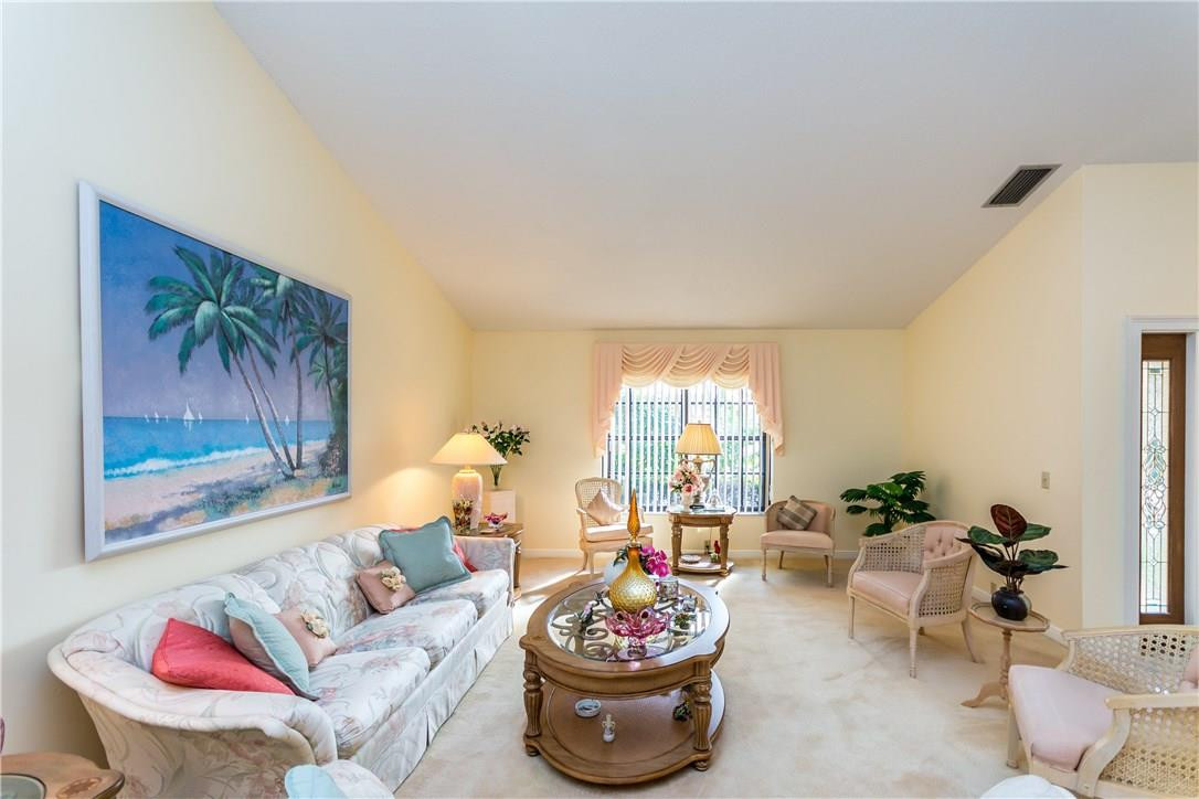 22870 Greenview Terrace Boca Raton, FL 33433 - Photo 5 of 57 a living room with furniture and a potted plant