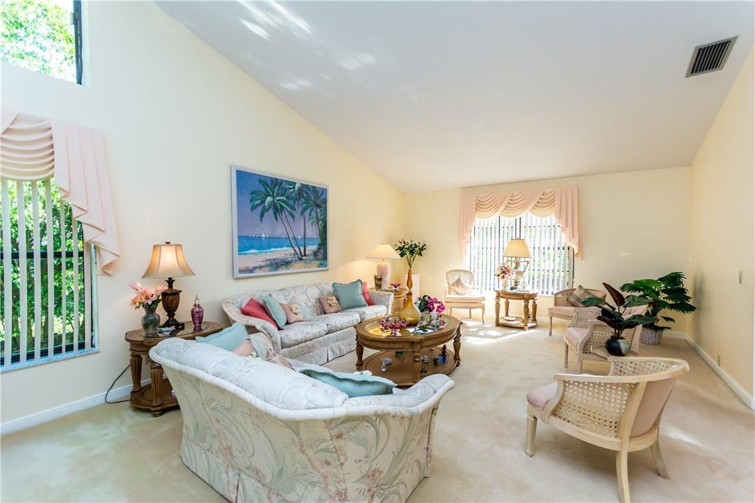 22870 Greenview Terrace Boca Raton, FL 33433 - Photo 6 of 57 a living room with furniture and a large window
