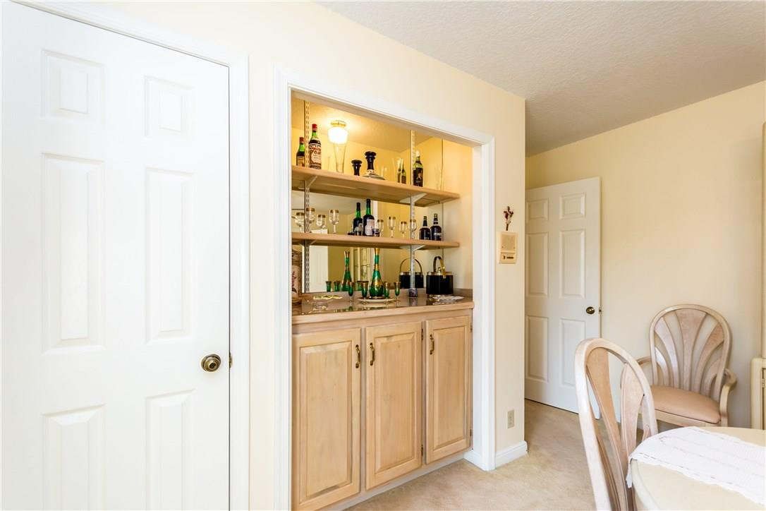 22870 Greenview Terrace Boca Raton, FL 33433 - Photo 8 of 57 a kitchen with stainless steel appliances granite countertop a refrigerator and cabinets