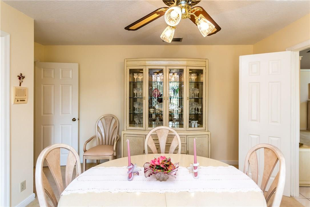 22870 Greenview Terrace Boca Raton, FL 33433 - Photo 9 of 57 a view of a dining room with furniture and window