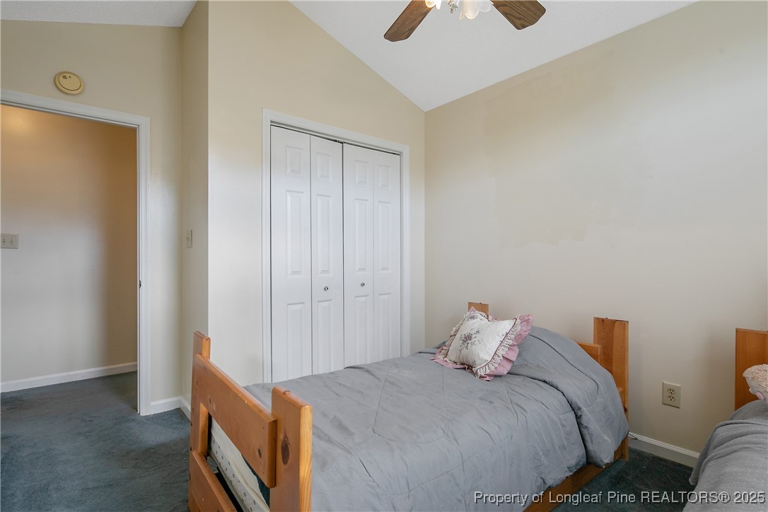 6042 Elliott Bridge Road Linden, NC 28356 - Photo 29 of 47 a bedroom with a bed and a cabinets
