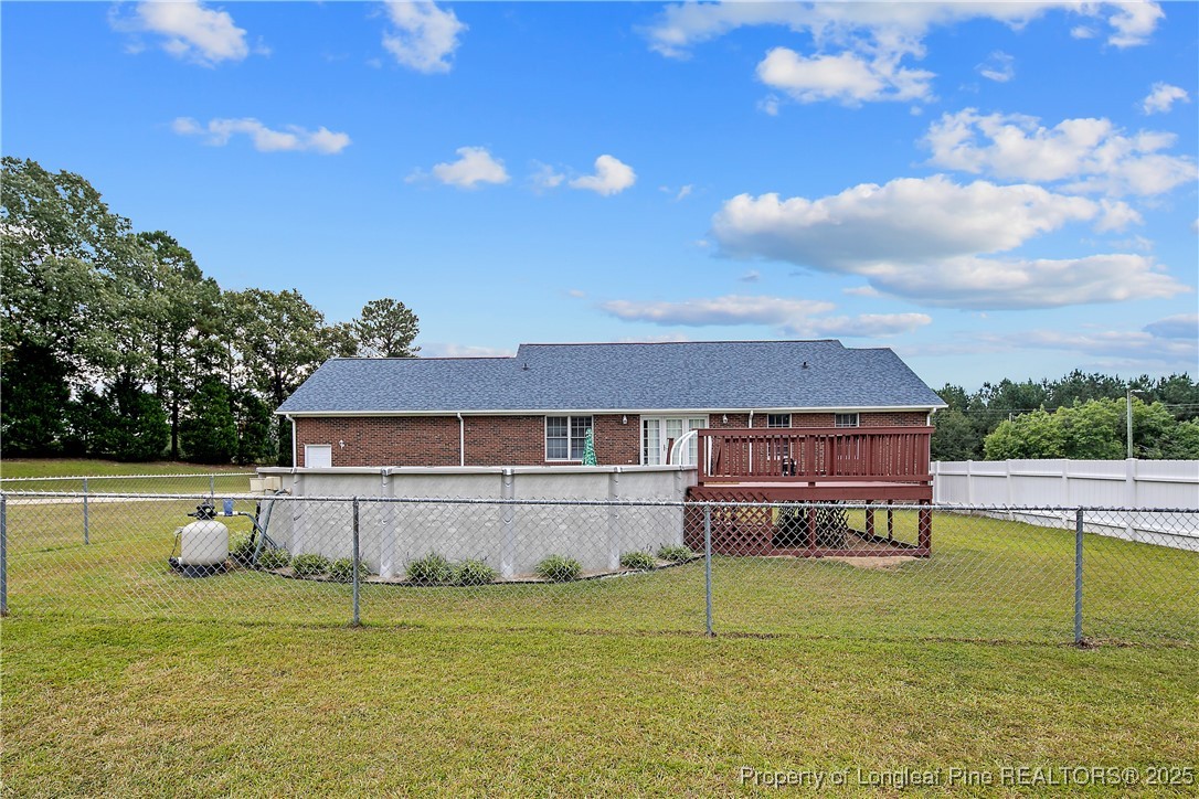 6042 Elliott Bridge Road Linden, NC 28356 - Photo 41 of 47 a view of a house with a yard