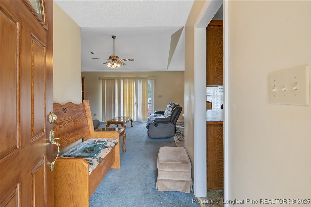 6042 Elliott Bridge Road Linden, NC 28356 - Photo 5 of 47 a living room with furniture and window
