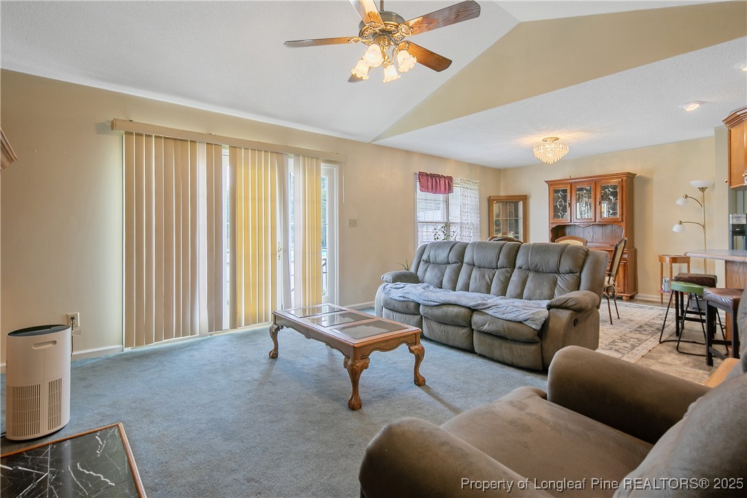 6042 Elliott Bridge Road Linden, NC 28356 - Photo 8 of 47 a living room with furniture and a window