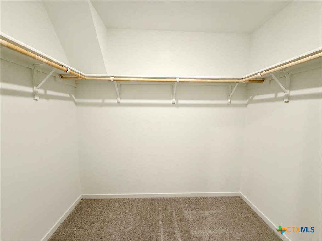 311 Moscato Road New Braunfels, TX 78130 - Photo 18 of 38 a view of an empty walk in closet