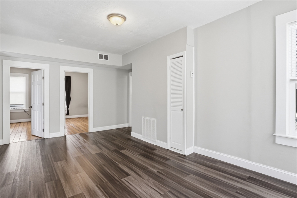 196 Irving Street Fall River, MA 02723 - Photo 11 of 34 wooden floor in an empty room