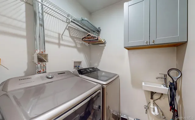 a front view of house with yard and trees