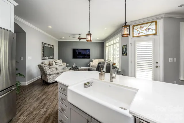 a very nice looking dining room with a large window