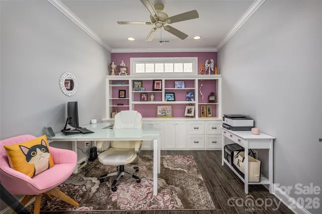 a workspace with furniture and window