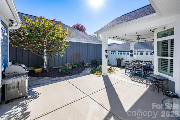 a view of a chairs and tables in the patio