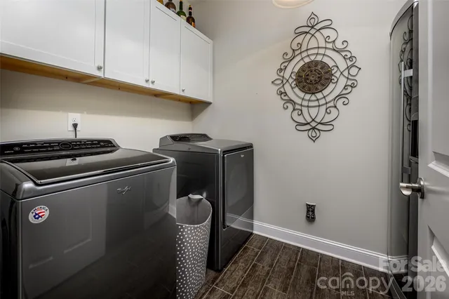 a room with a stove and a refrigerator