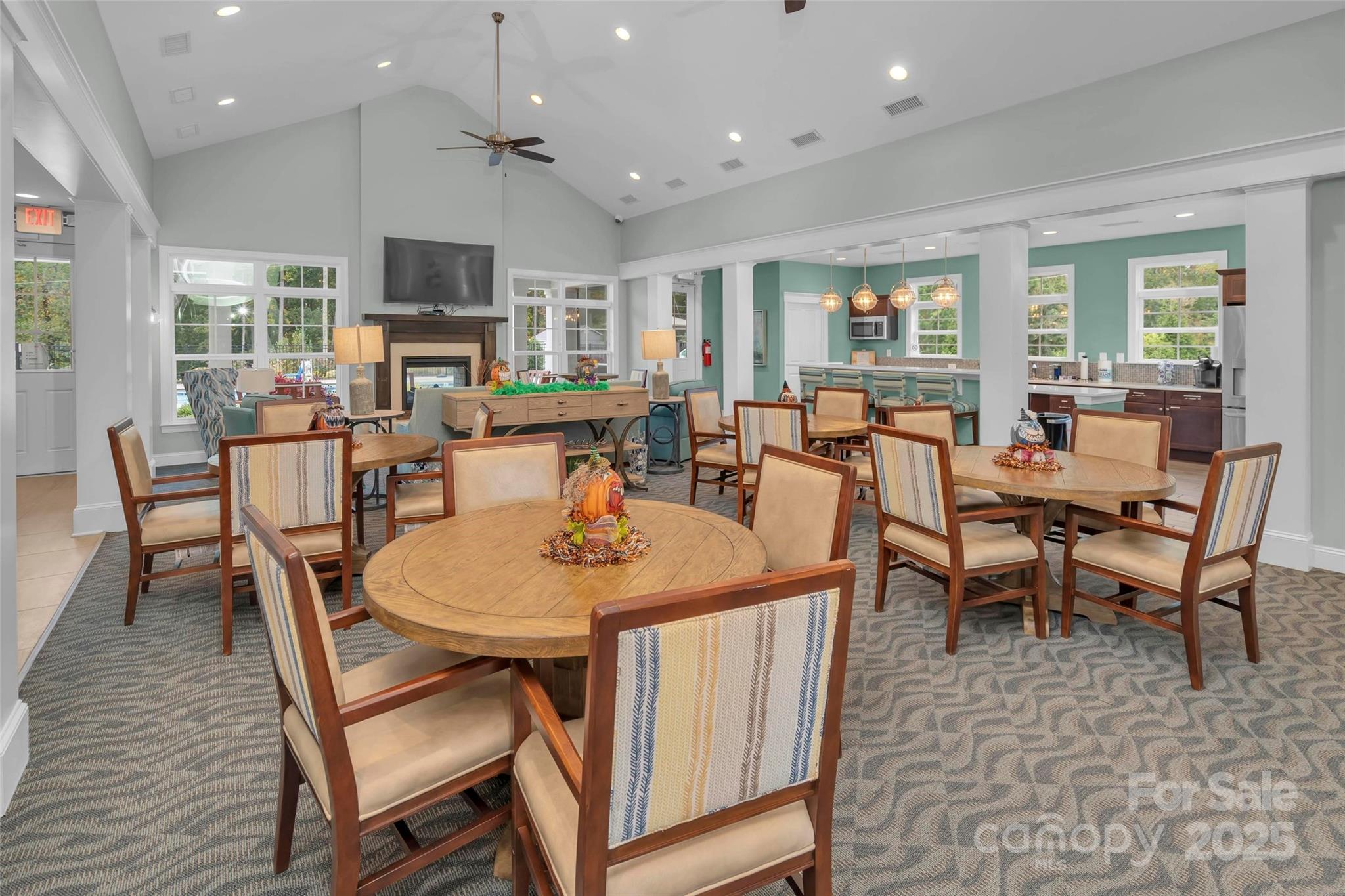16215 Lakeside Loop Lane Cornelius, NC 28031 - Photo 46 of 48 a view of a dining room with furniture window and wooden floor