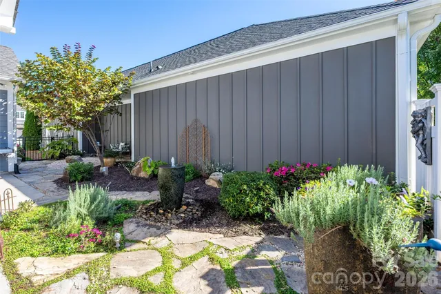 a view of a backyard with plants