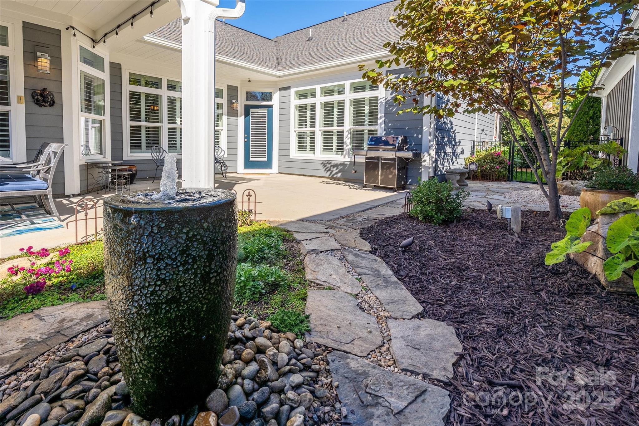 16215 Lakeside Loop Lane Cornelius, NC 28031 - Photo 9 of 48 a view of a house with backyard and sitting area