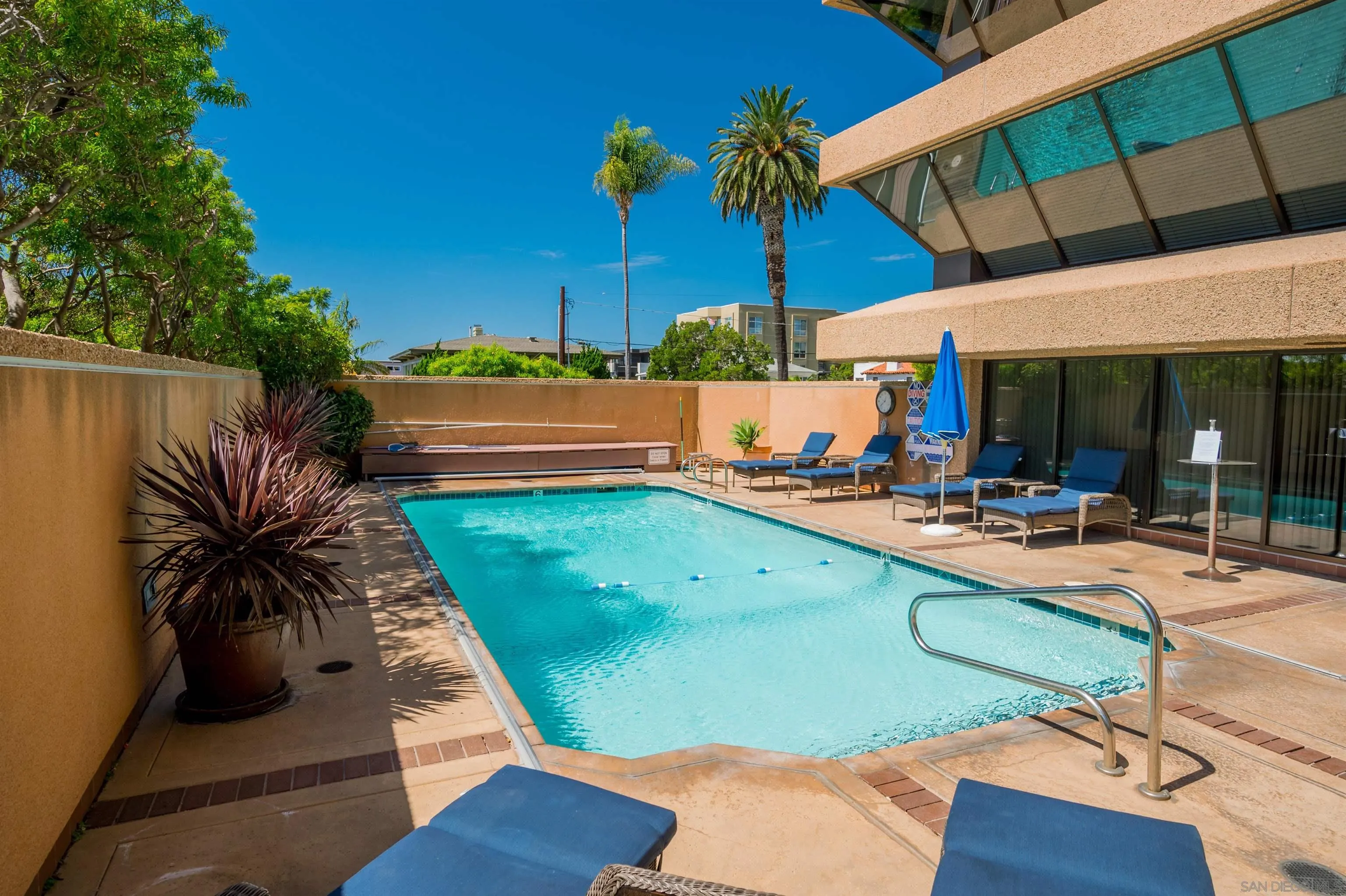 230 West Laurel Street, Unit 1001 San Diego, CA 92101 - Photo 37 of 44 a view of a swimming pool with a patio