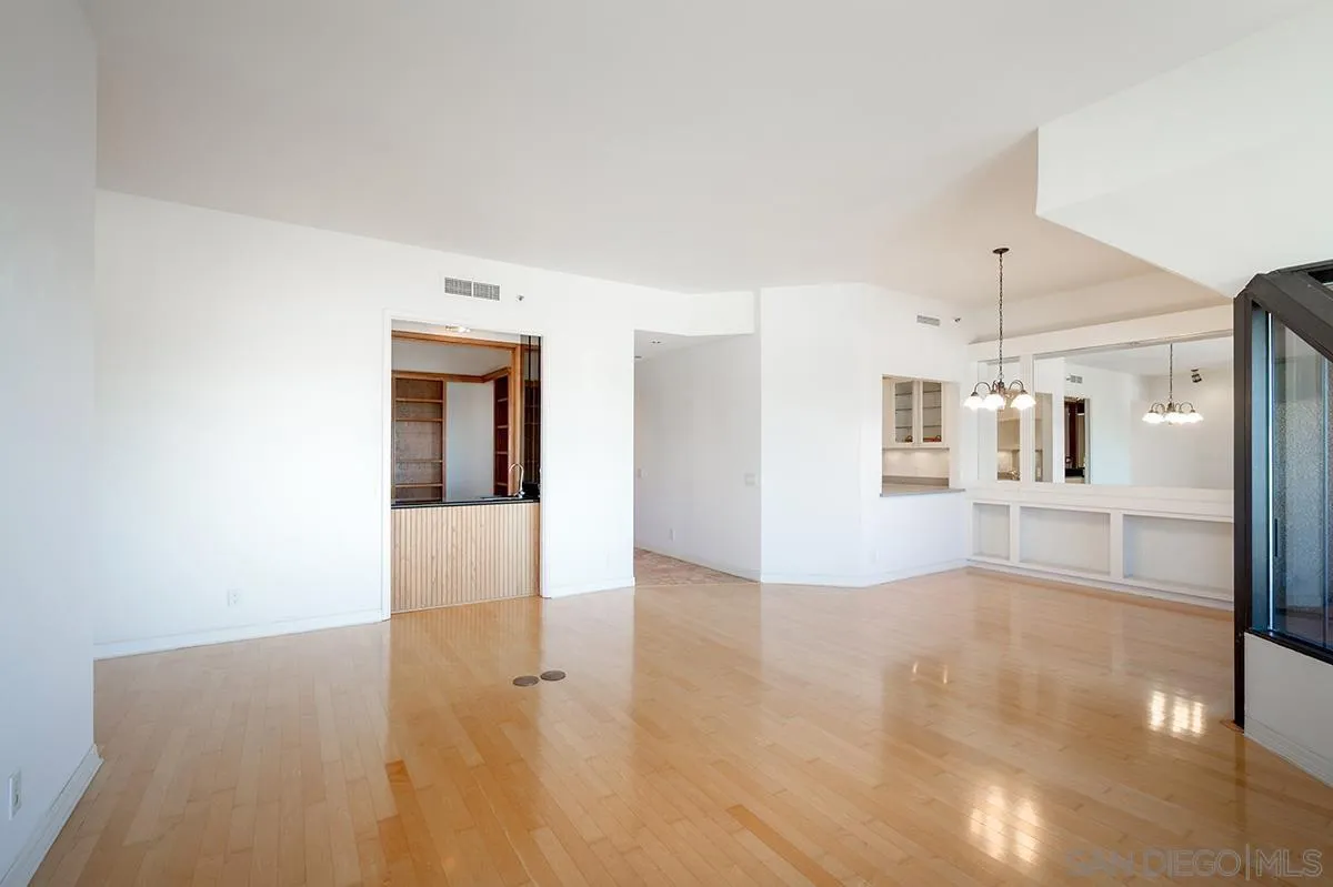 230 West Laurel Street, Unit 1001 San Diego, CA 92101 - Photo 5 of 44 a view of a kitchen with wooden floor