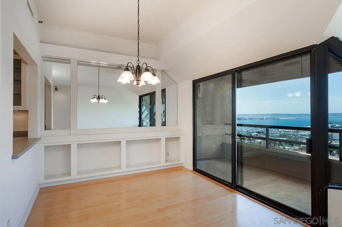 230 West Laurel Street, Unit 1001 San Diego, CA 92101 - Photo 6 of 44 a view of a room with a chandelier