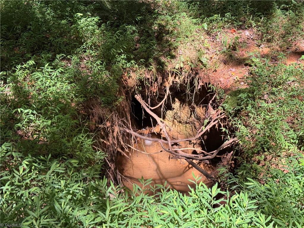 11218 Nc 268 Elkin, NC 28621 - Photo 17 of 25 Underground natural spring on the property.