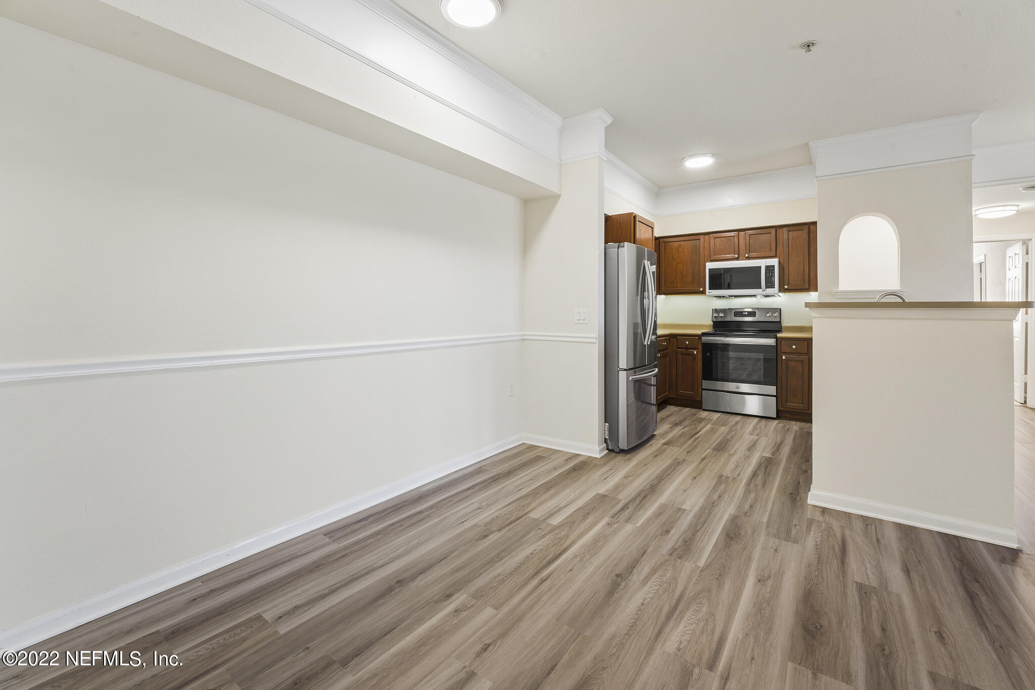 8550 Touchton Road, Unit 812 Jacksonville, FL 32216 - Photo 8 of 44 a view of kitchen with wooden floor