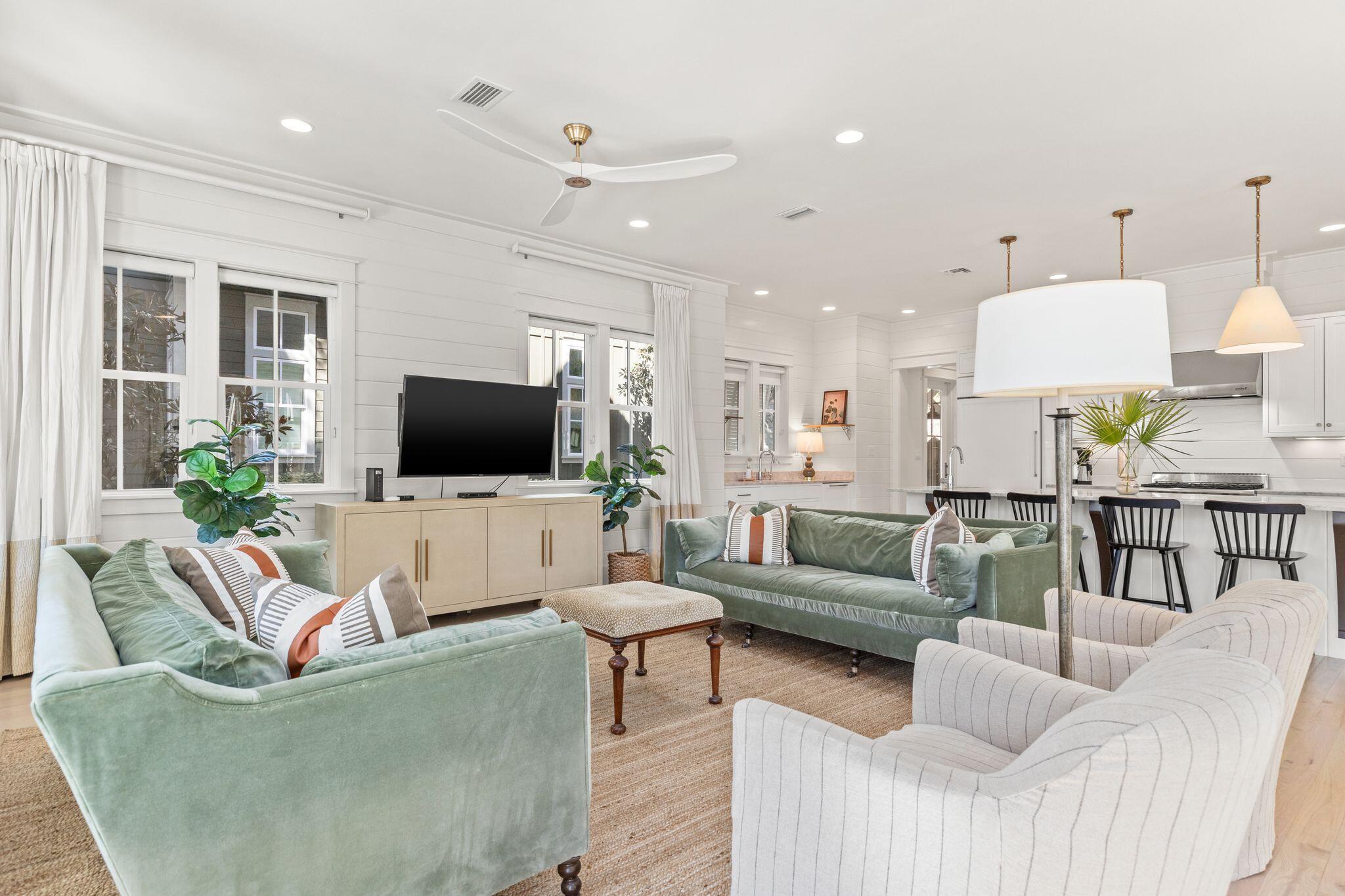 97 Sunflower Street Santa Rosa Beach, FL 32459 - Photo 12 of 86 a living room with furniture and a flat screen tv