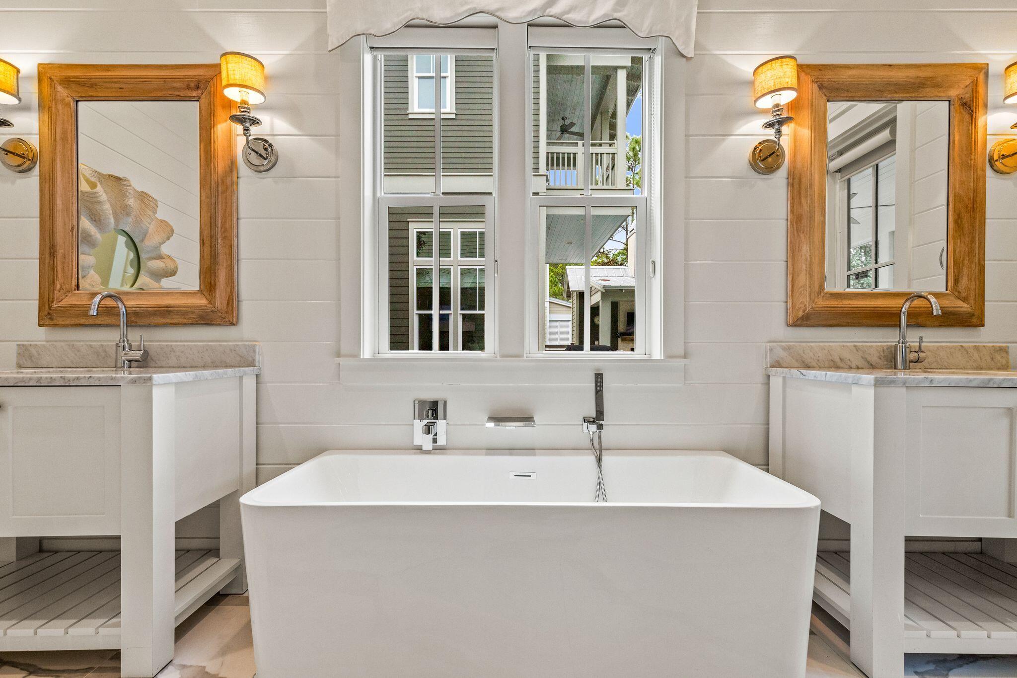 97 Sunflower Street Santa Rosa Beach, FL 32459 - Photo 28 of 86 a bathroom with a sink and a mirror