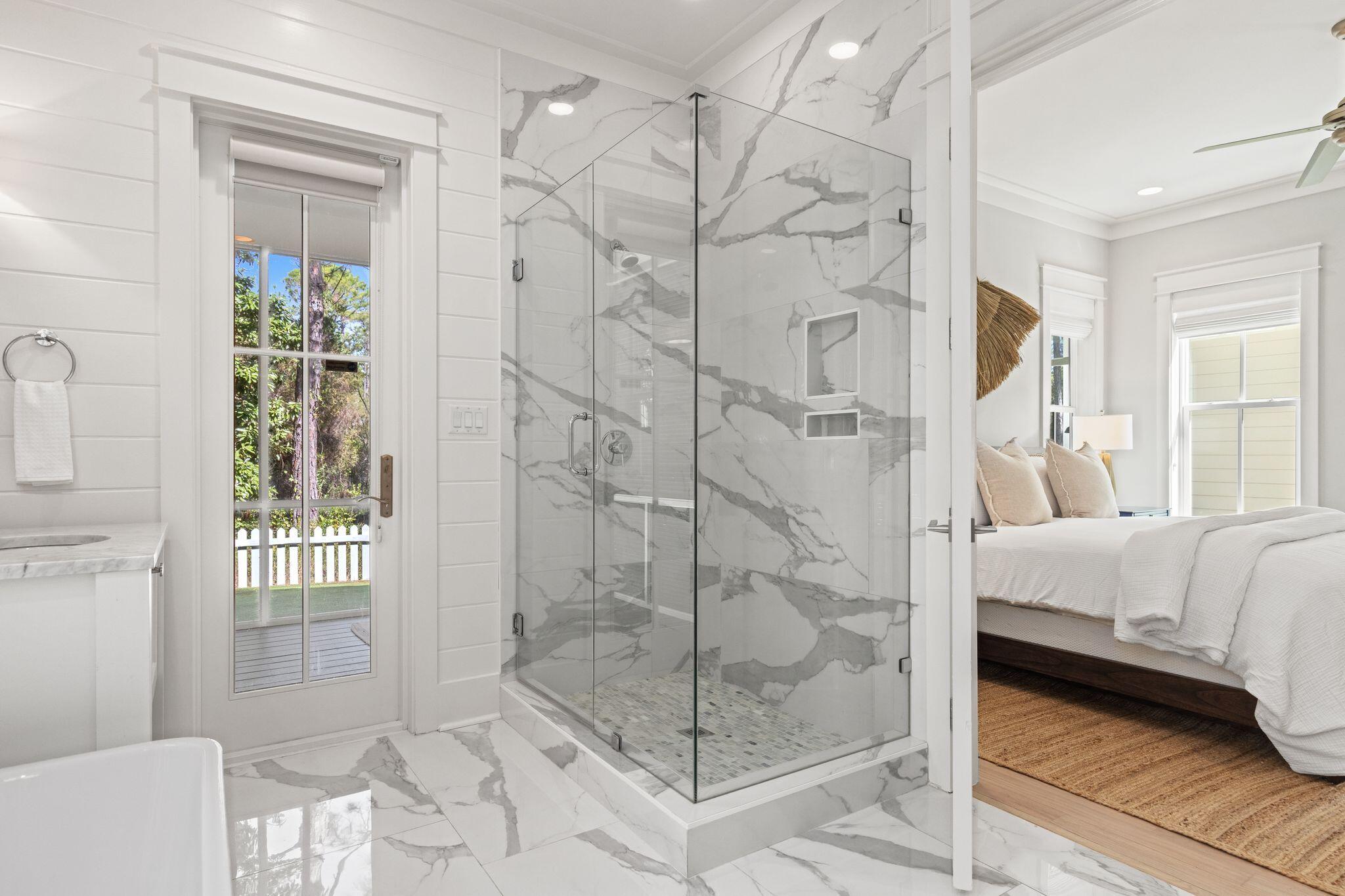 97 Sunflower Street Santa Rosa Beach, FL 32459 - Photo 30 of 86 a bedroom with a bed and a window