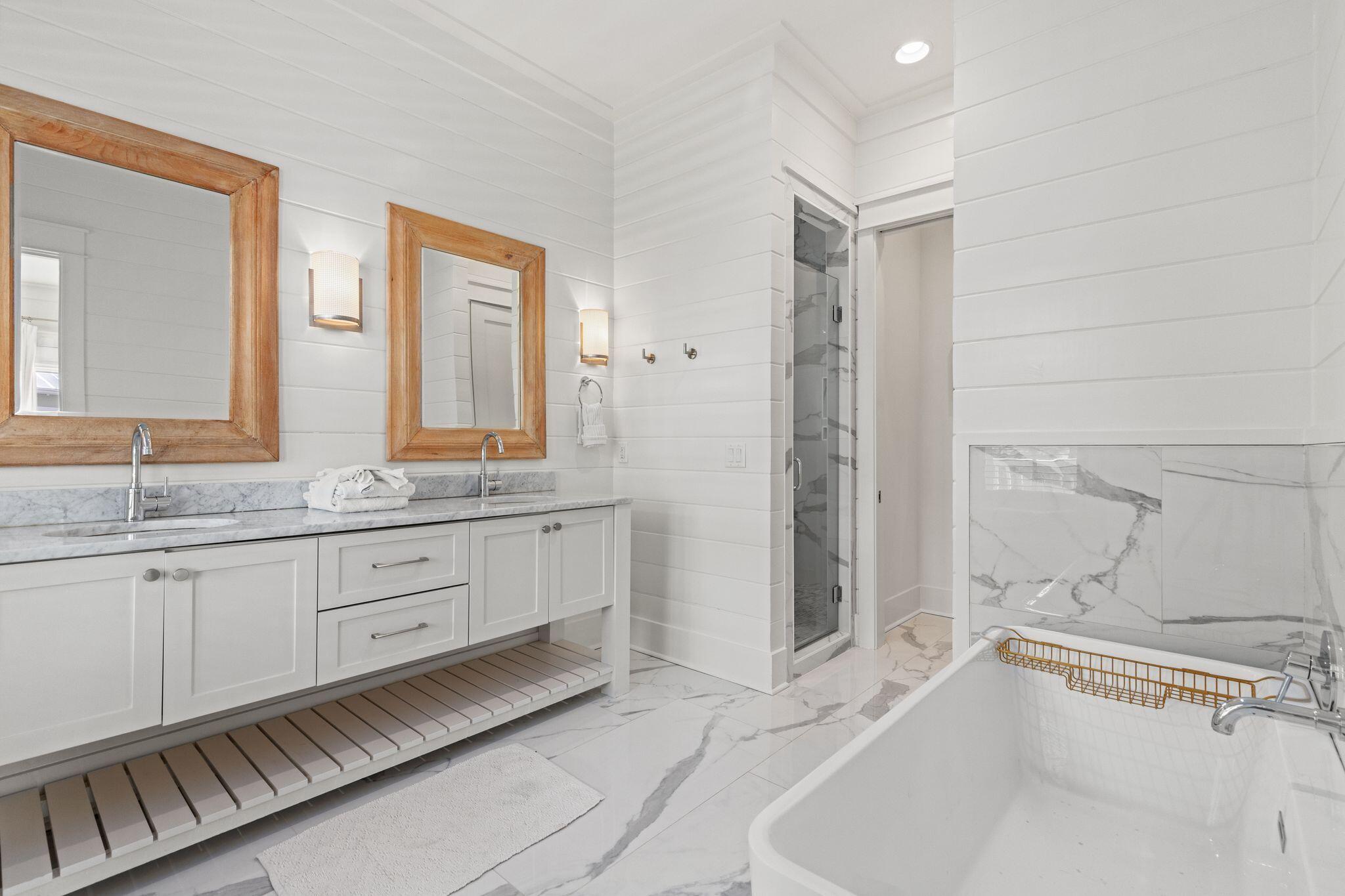 97 Sunflower Street Santa Rosa Beach, FL 32459 - Photo 39 of 86 a bathroom with a granite countertop sink and a mirror