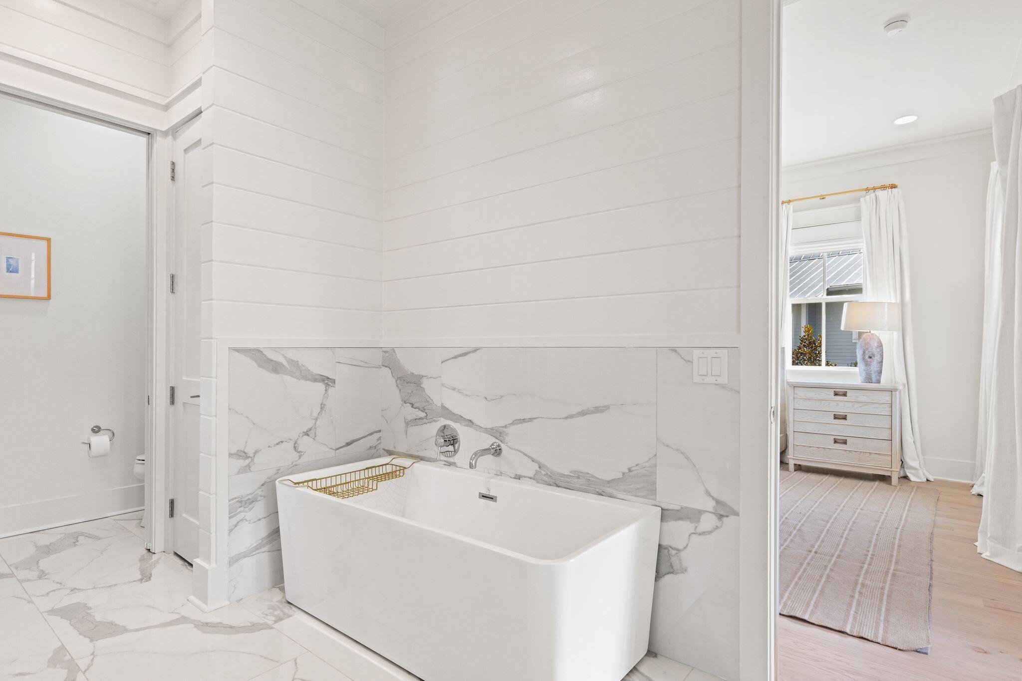 97 Sunflower Street Santa Rosa Beach, FL 32459 - Photo 40 of 86 a view of a bathroom with a sink and mirror