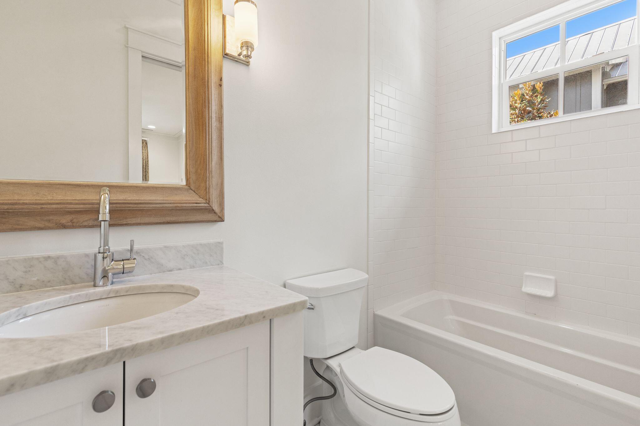 97 Sunflower Street Santa Rosa Beach, FL 32459 - Photo 45 of 86 a bathroom with a sink toilet and shower