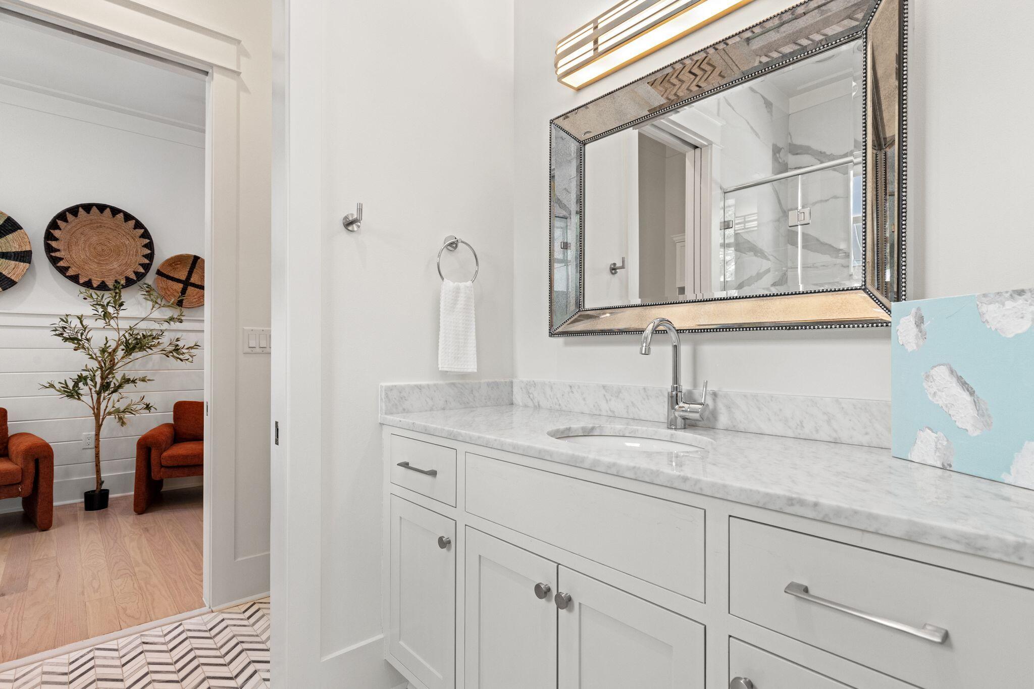 97 Sunflower Street Santa Rosa Beach, FL 32459 - Photo 49 of 86 a en suite bathroom with a sink and a mirror