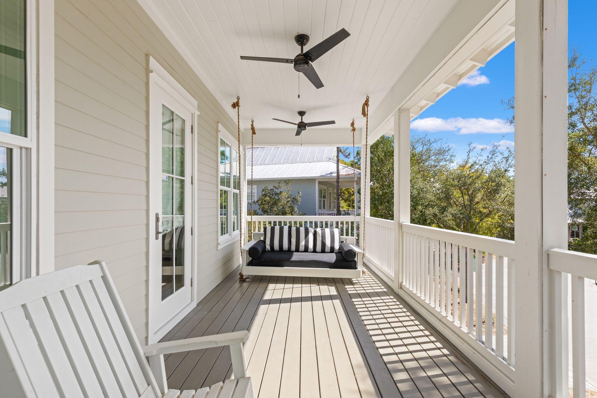 97 Sunflower Street Santa Rosa Beach, FL 32459 - Photo 53 of 86 a view of a balcony with wooden floor