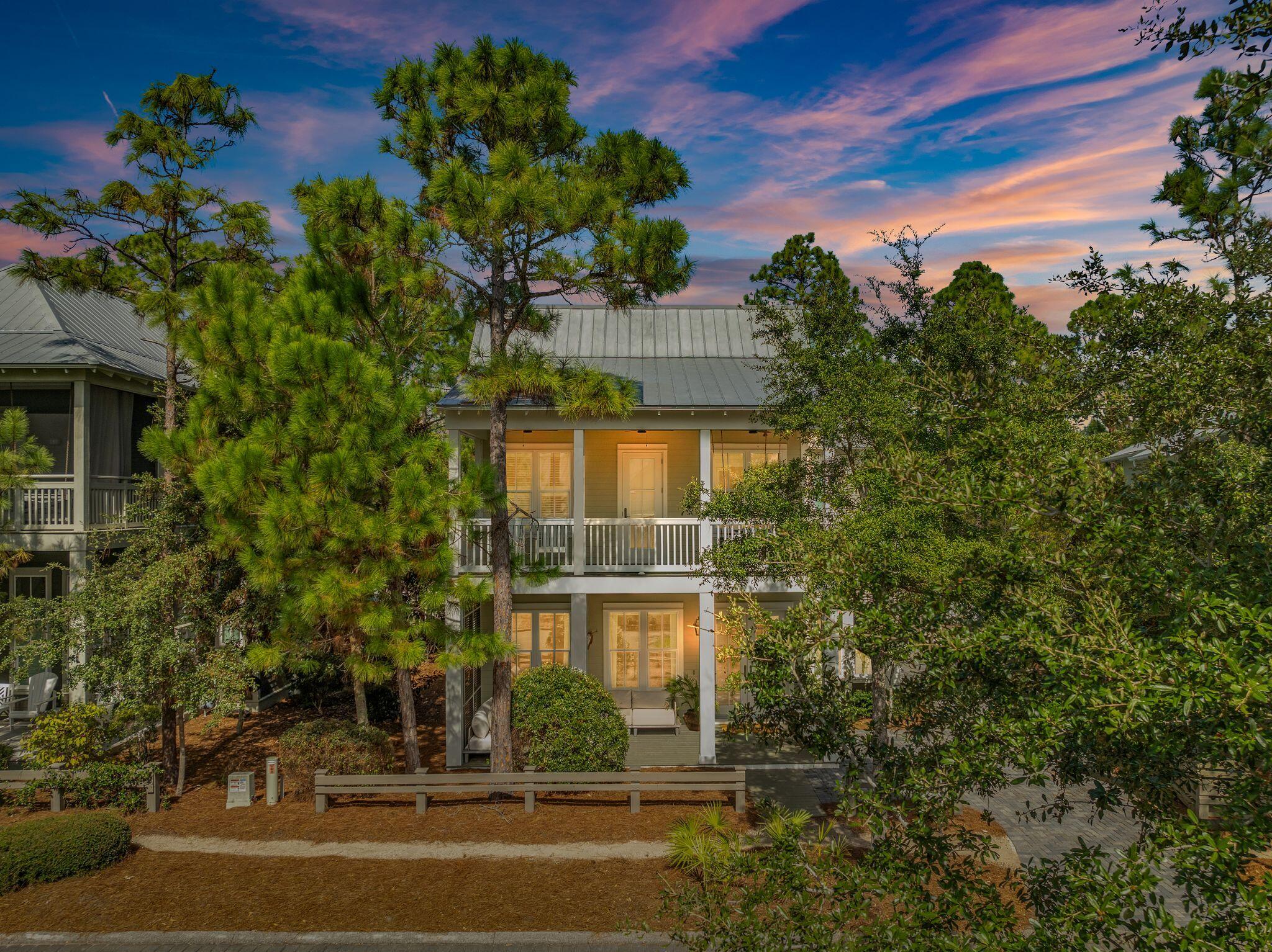 97 Sunflower Street Santa Rosa Beach, FL 32459 - Photo 64 of 86 a front view of a house with a yard
