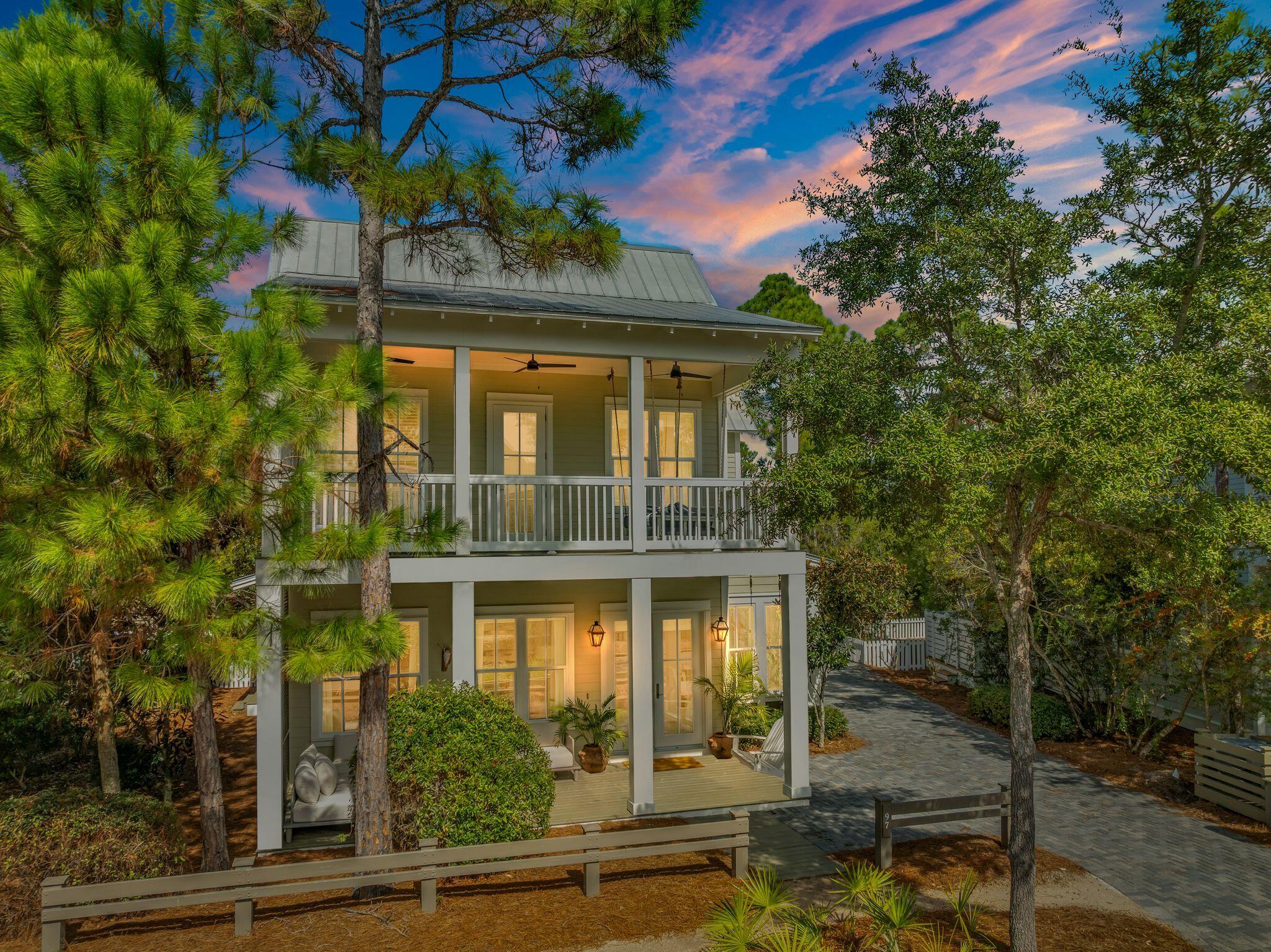 97 Sunflower Street Santa Rosa Beach, FL 32459 - Photo 66 of 86 a front view of a house with a yard