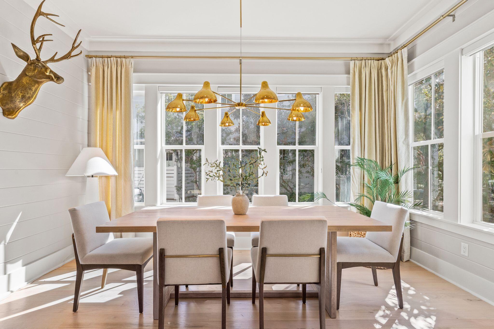 97 Sunflower Street Santa Rosa Beach, FL 32459 - Photo 9 of 86 a view of a dining room with furniture and a window
