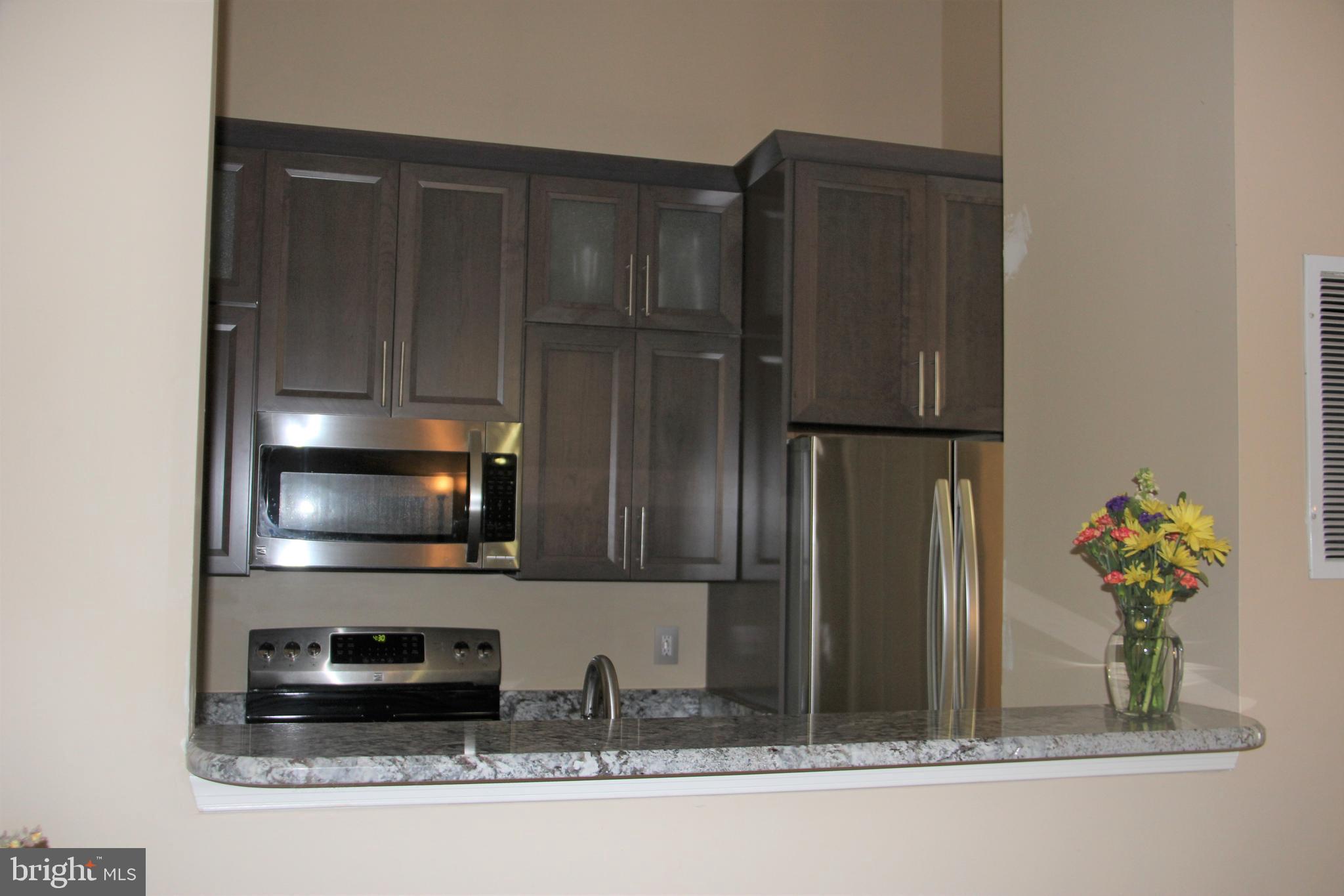8194 Hicks Road Jessup, MD 20794 - Photo 16 of 57 View to Kitchen from Living Room