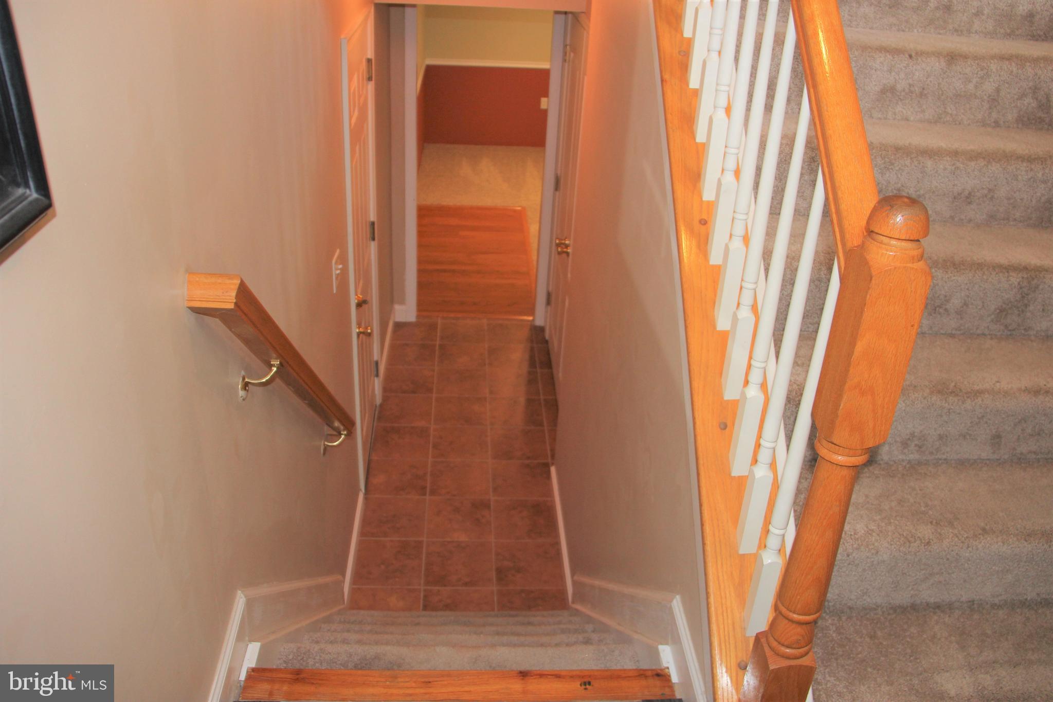 8194 Hicks Road Jessup, MD 20794 - Photo 36 of 57 Foyer to Finished Basement
