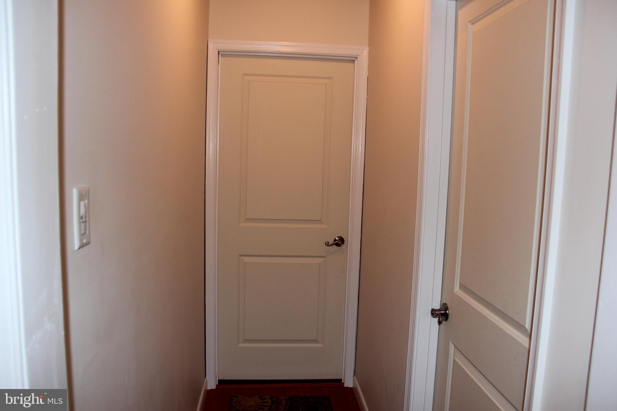 8194 Hicks Road Jessup, MD 20794 - Photo 43 of 57 Door to Laundry Room