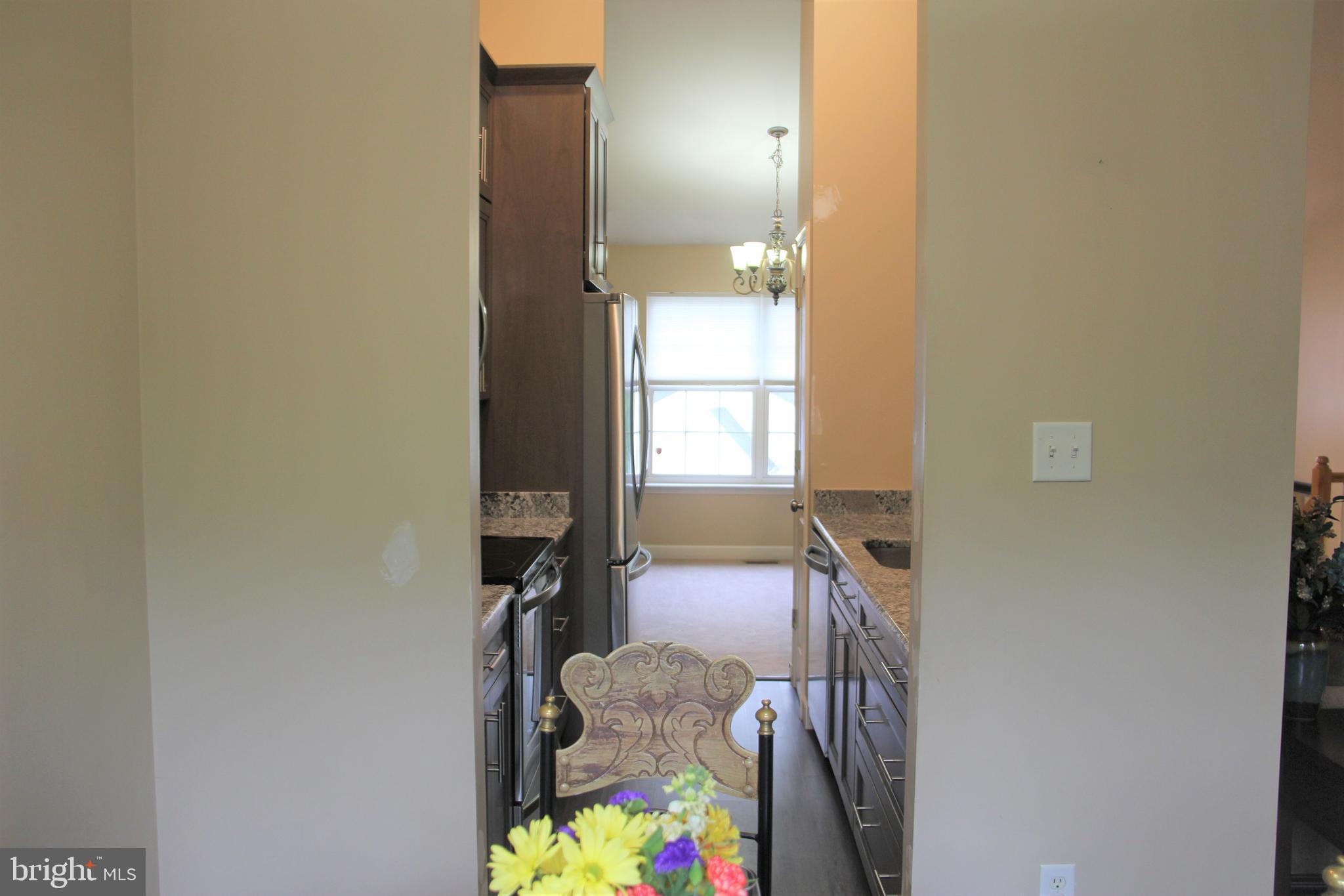 8194 Hicks Road Jessup, MD 20794 - Photo 10 of 57 View from Breakfast Room to Kitchen and Dining Rm