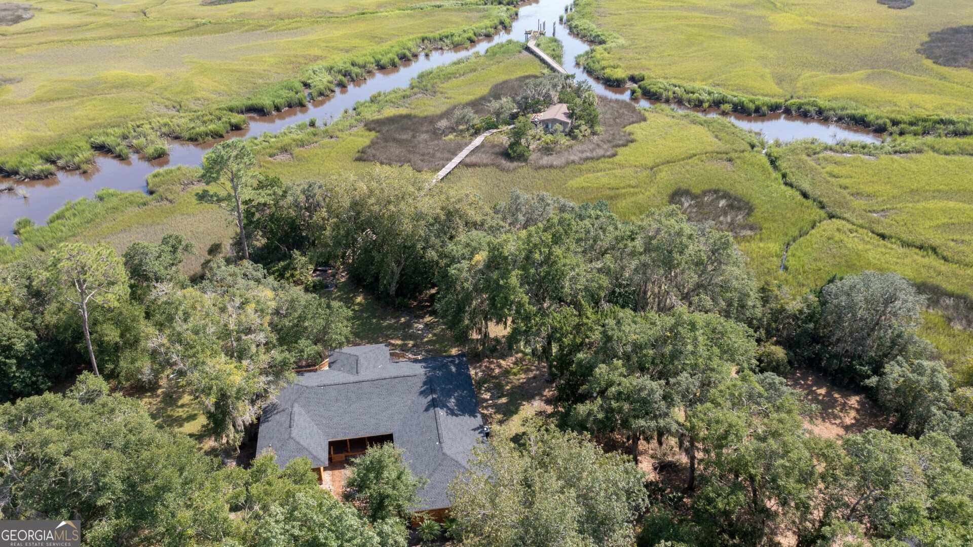1924 Cedar Court Waverly, GA 31565 - Photo 4 of 78 an aerial view of ocean beach and residential house with outdoor space