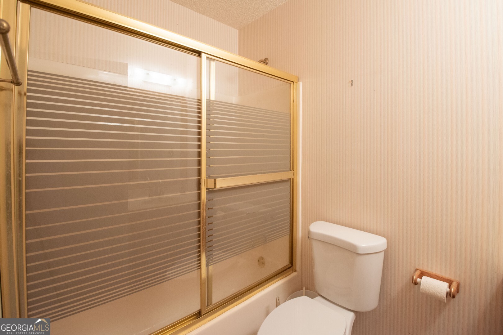 1924 Cedar Court Waverly, GA 31565 - Photo 43 of 78 a bathroom with a toilet and a shower