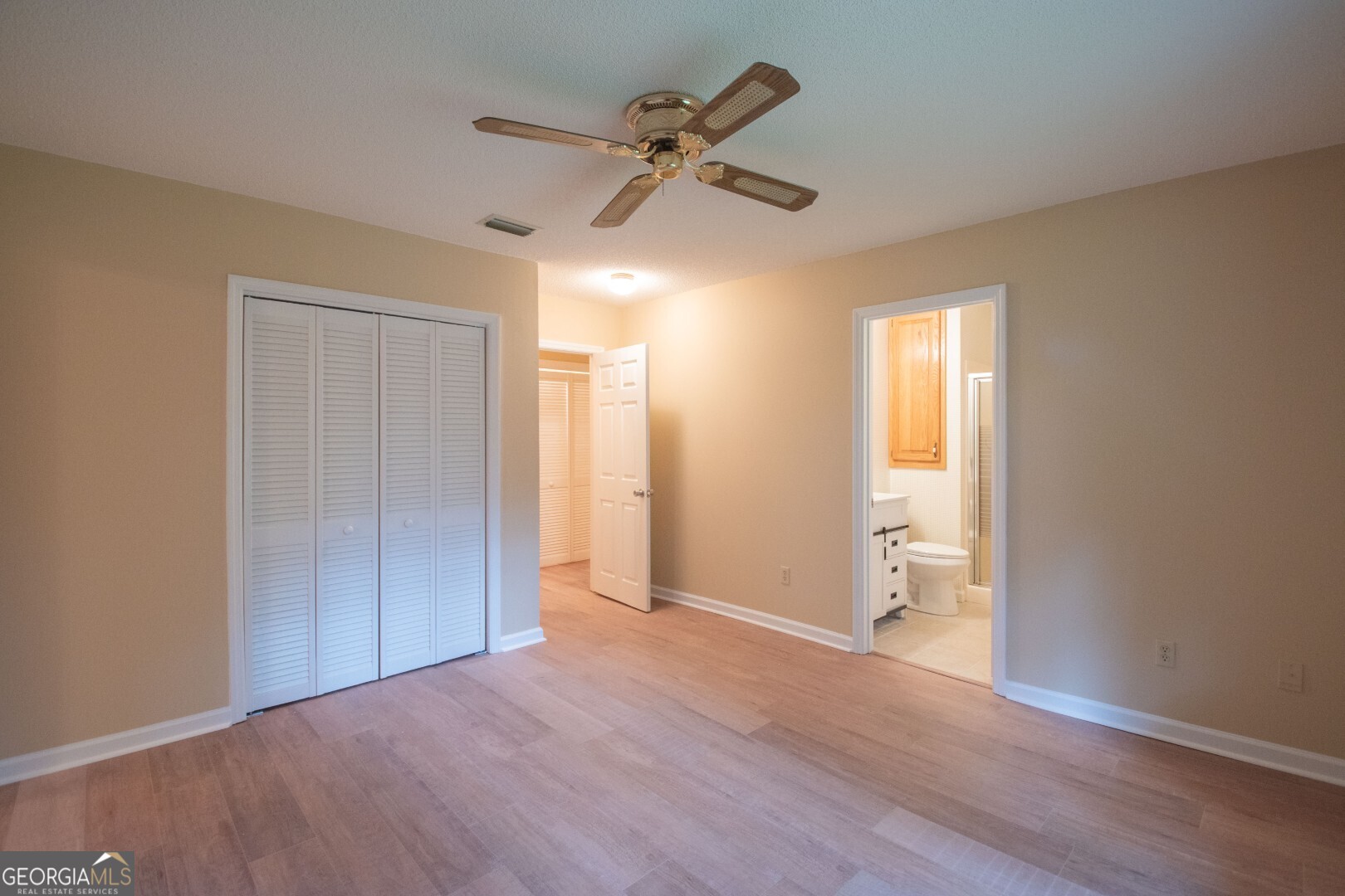 1924 Cedar Court Waverly, GA 31565 - Photo 46 of 78 a view of an empty room and a ceiling fan window