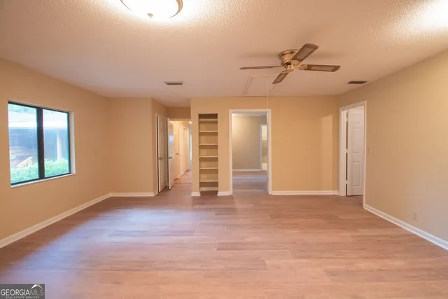a backyard of a house with seating space