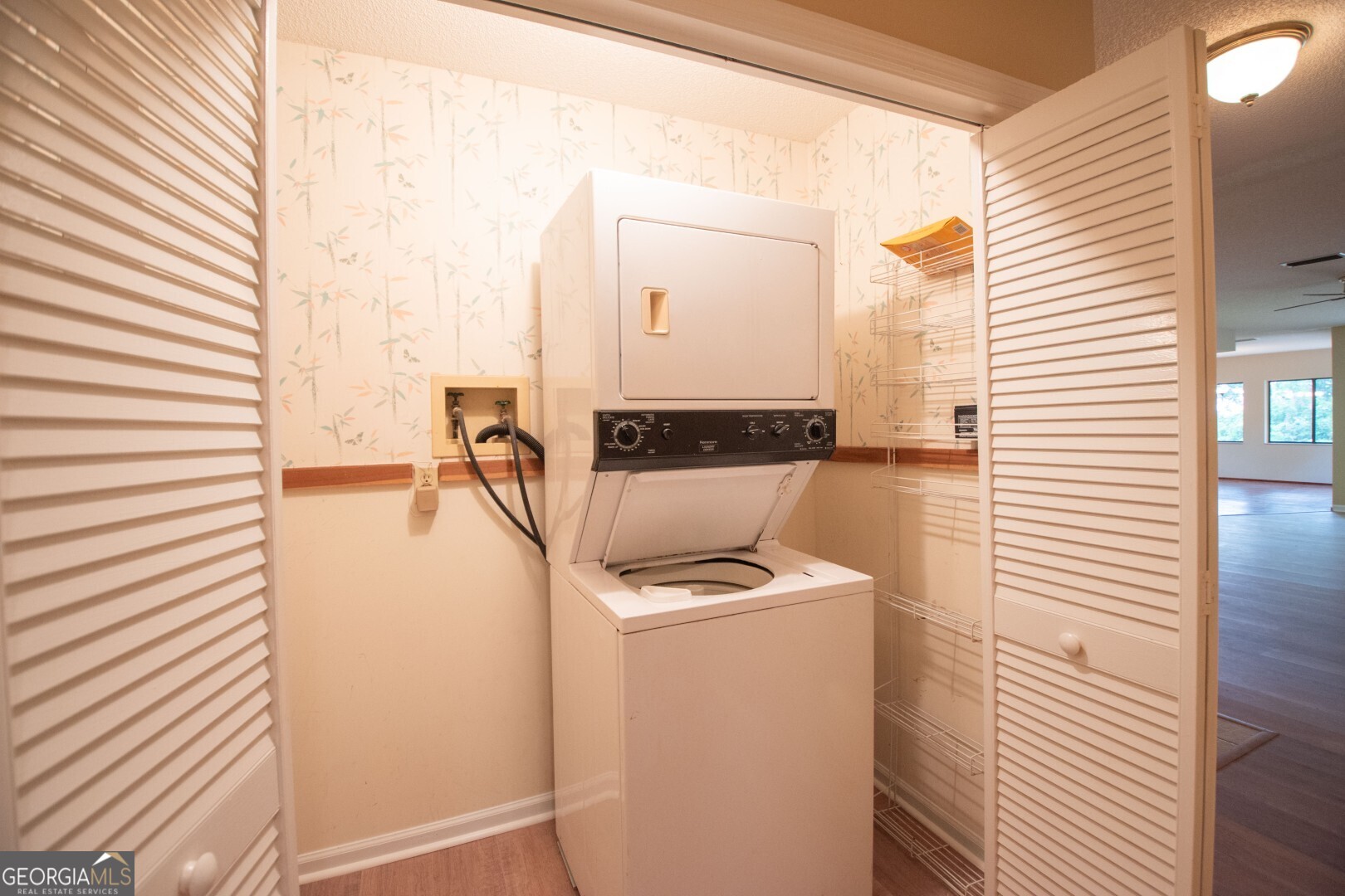 1924 Cedar Court Waverly, GA 31565 - Photo 53 of 78 a view of a storage & utility room with washer and dryer