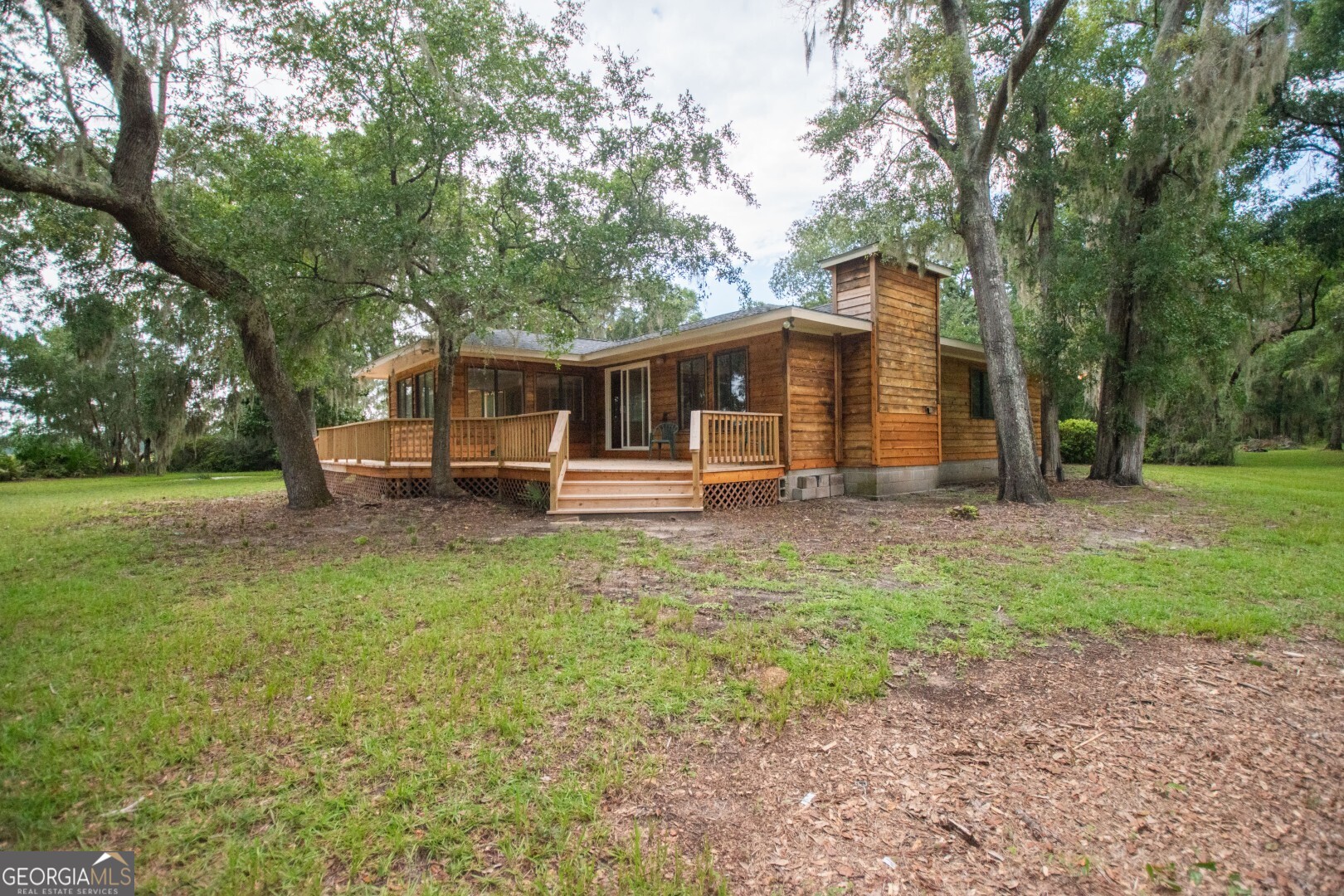 1924 Cedar Court Waverly, GA 31565 - Photo 60 of 78 a front view of house with garden