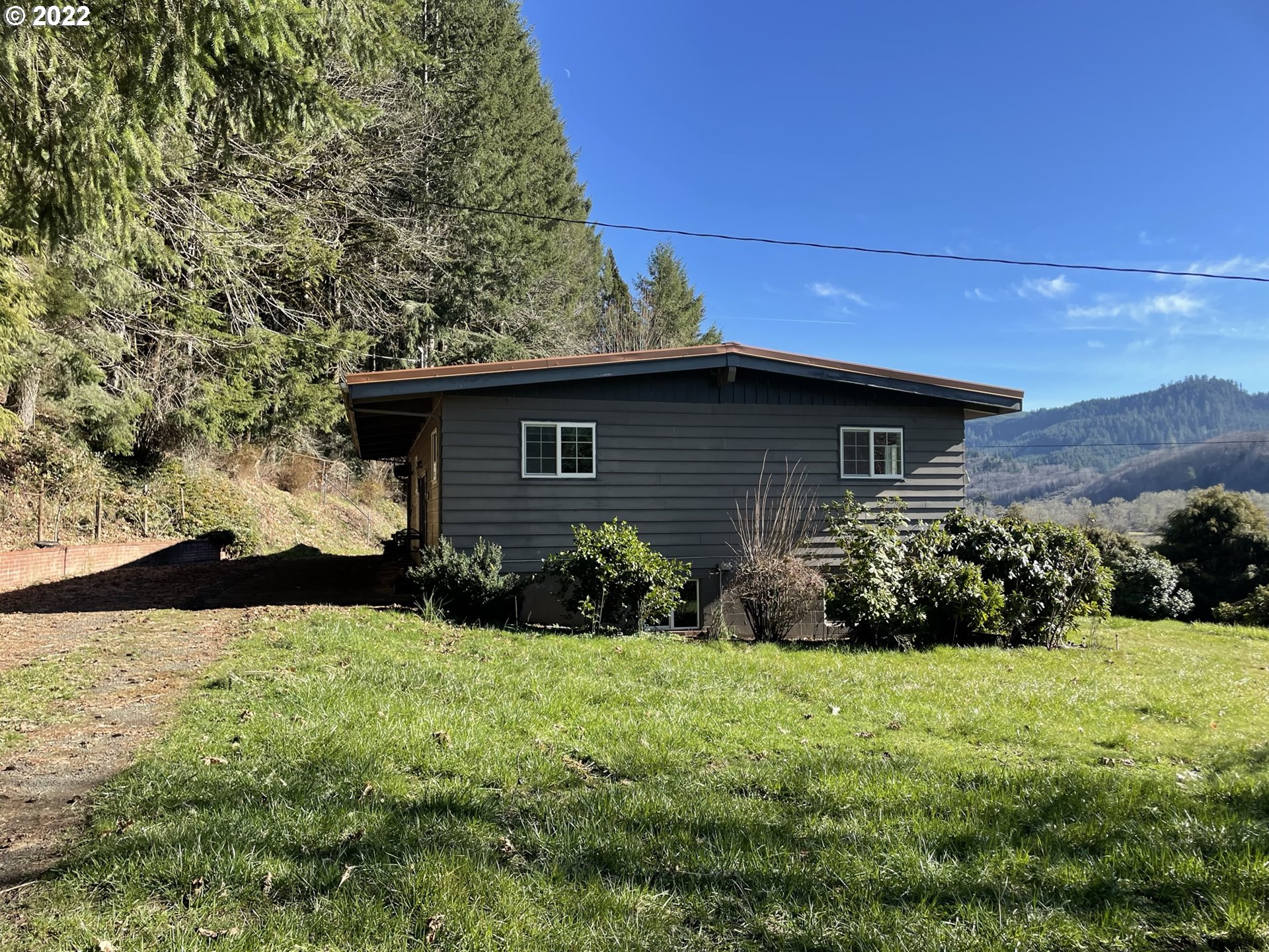 19975 Highway 36 Blachly, OR 97412 - Photo 1 of 32 a front view of house with yard and green space