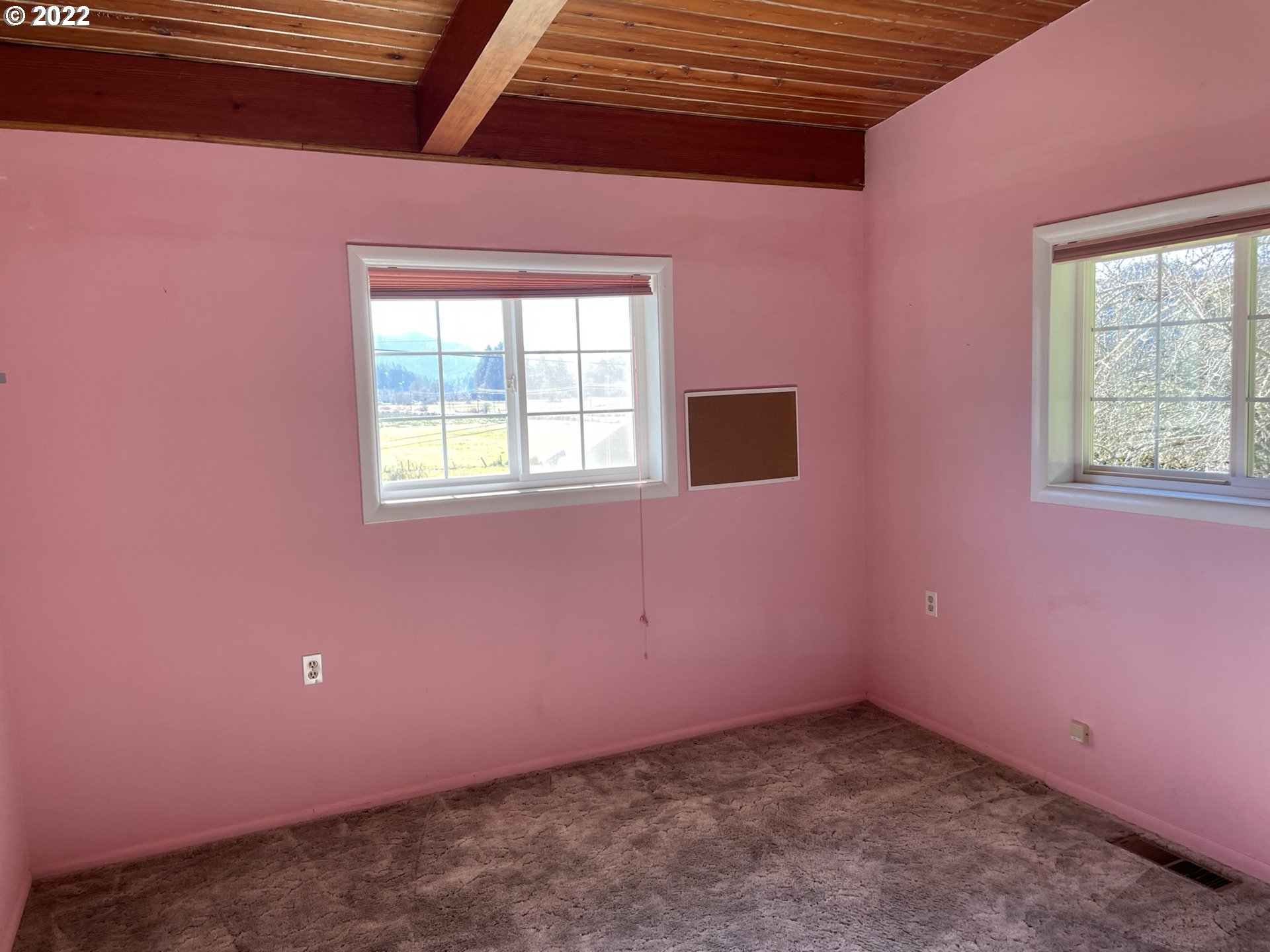 19975 Highway 36 Blachly, OR 97412 - Photo 15 of 32 a view of an empty room with a window