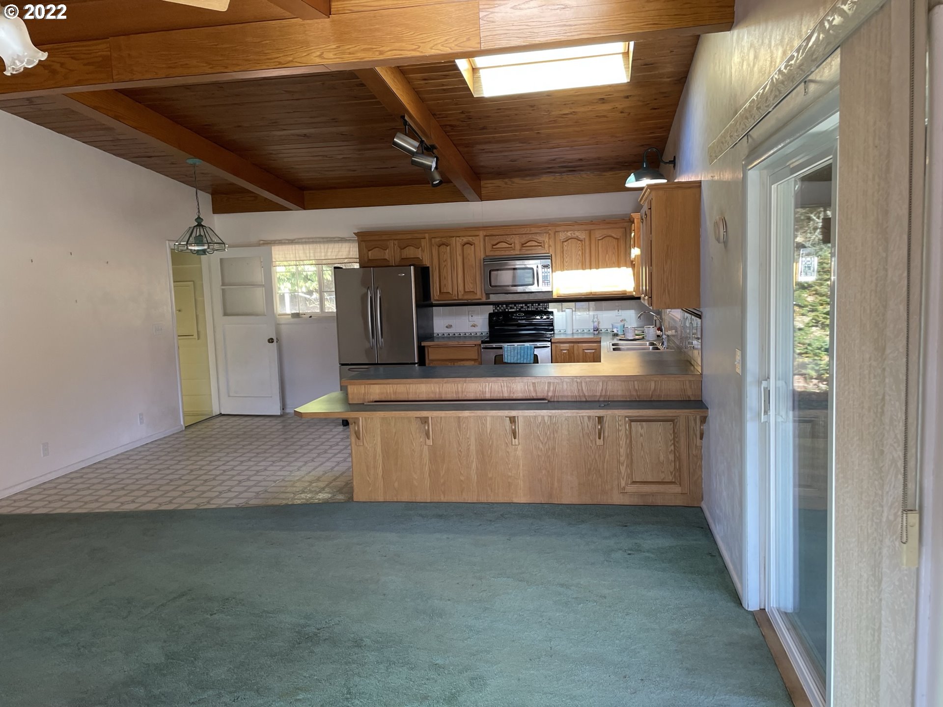 19975 Highway 36 Blachly, OR 97412 - Photo 6 of 32 a kitchen with stainless steel appliances a sink and cabinets
