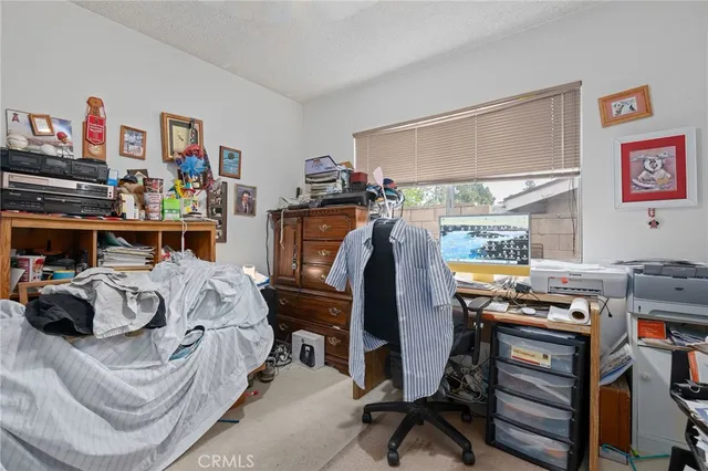 a bathroom with double sink and a mirror